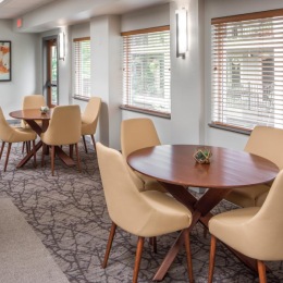 a room with tables and chairs
