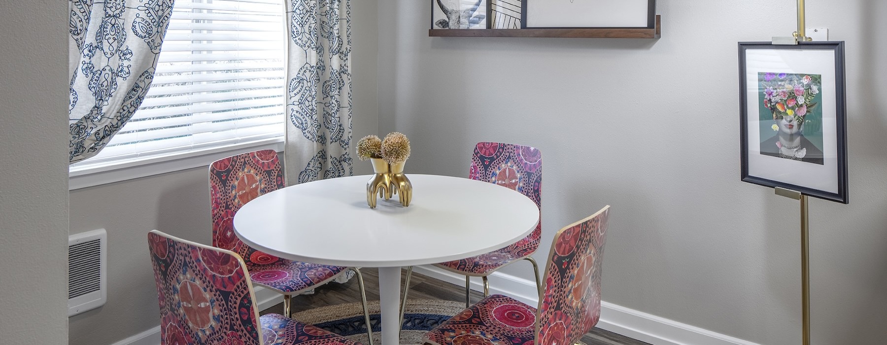 a dining table with chairs around it