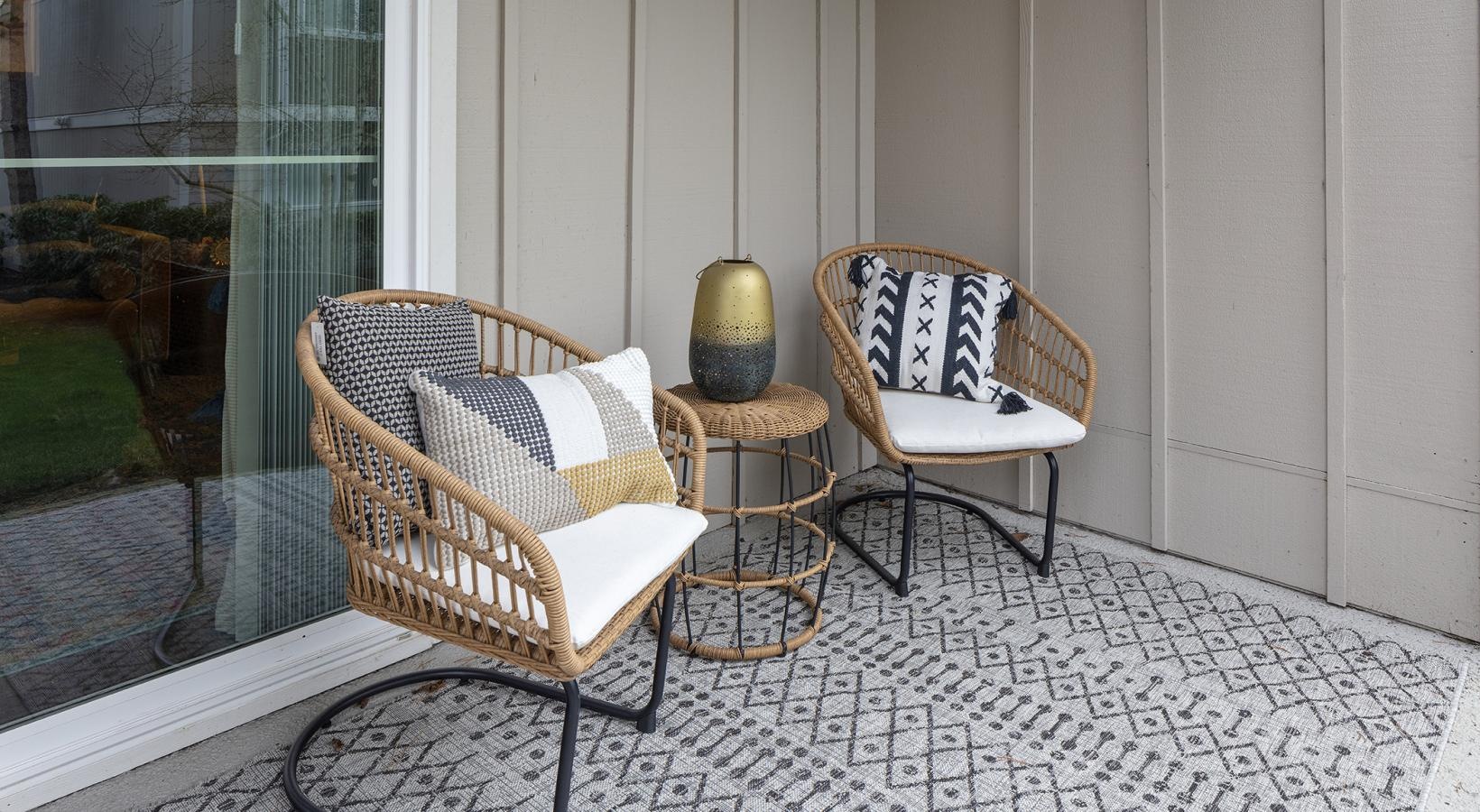 a couple of chairs and a table